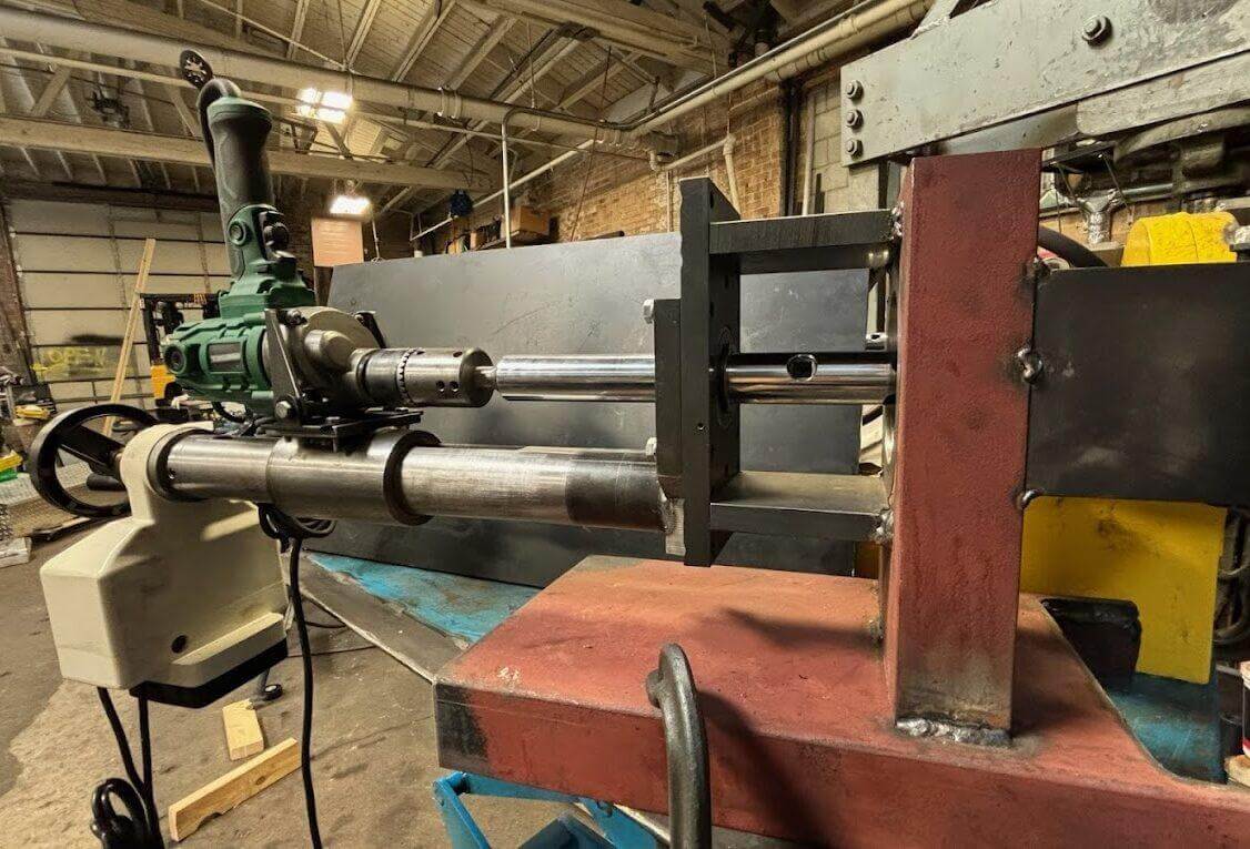 Line boring power feed set up on a repair job in the shop